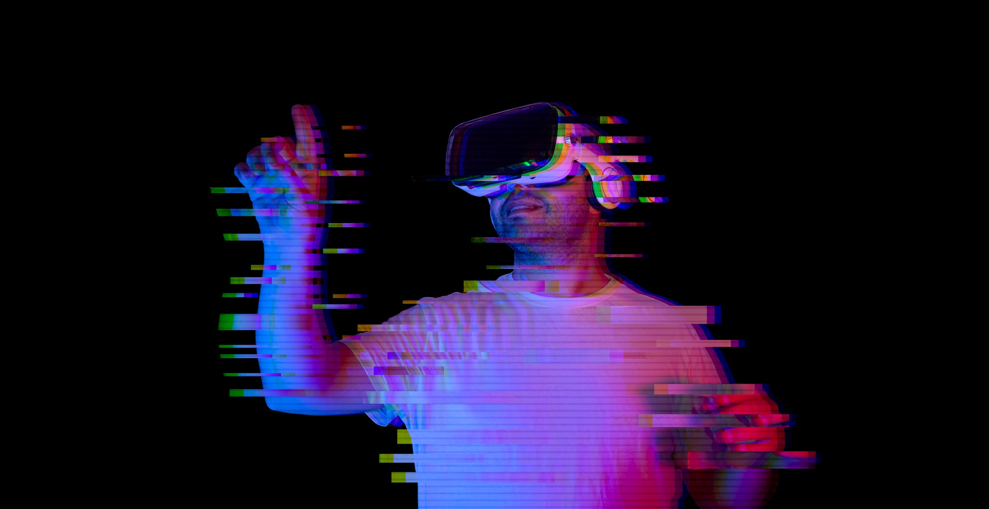 Young man using vr glasses with glitch effect. new virtual world metaverse